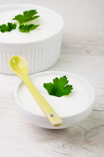 Homemade white milk product and parsley on the top