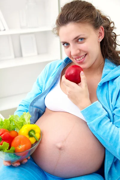 Pregnant woman and healthy food