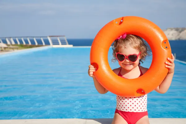 Little girl goes to pool