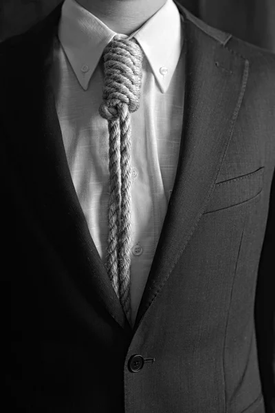 Portrait of man with loop tie