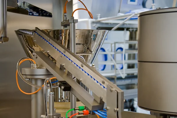 Production of medicines, part of a closing machine
