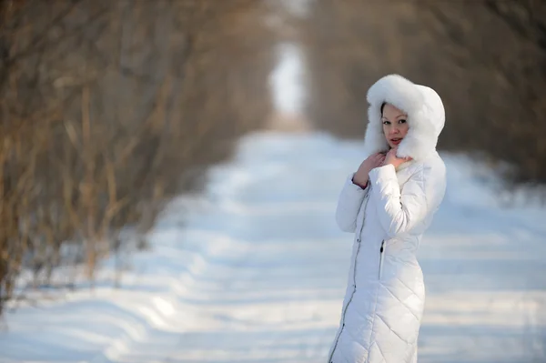 The woman in the winter white clothes