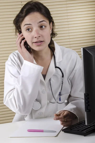 Medical staff is talking on a phone