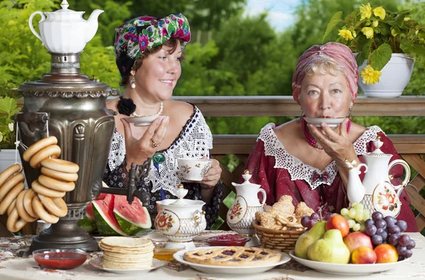 Two women enjoying a cup of tea