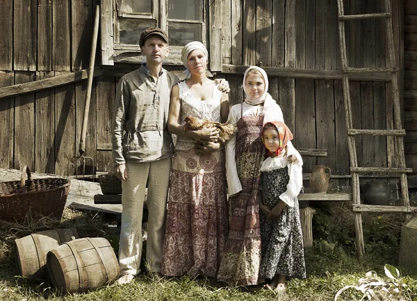 Vintage styled portrait of countryside family