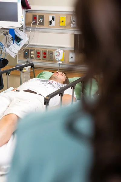 Patient Lying On Bed In Hospital Emergency
