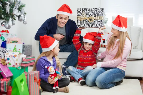 Playful Family With Christmas Gifts