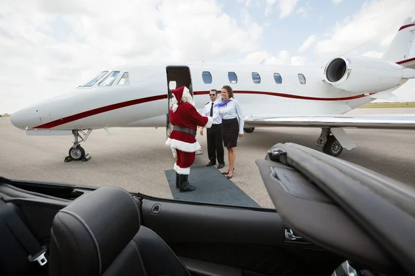 Private Jet Crew Greet Santa