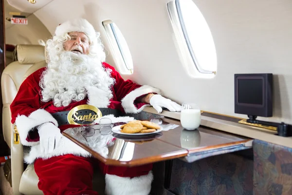 Santa Sleeping In Private Jet