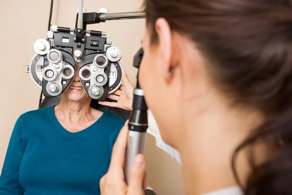 Optometrist Examining Patient's Vision