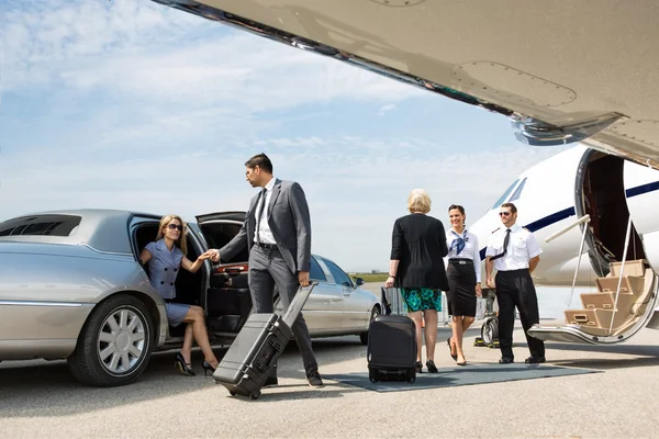 Business Partners About To Board Private Jet