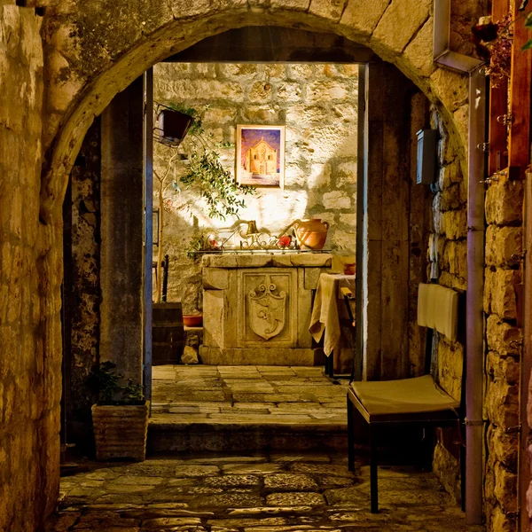 Mediterranean restaurant entrance at night