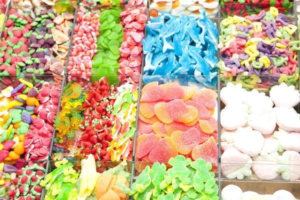 Colored marmalade exposed in market Barcelona