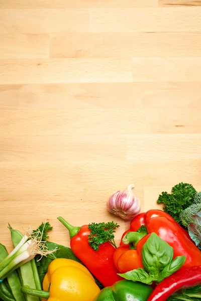 Healthy Organic Vegetables on a Wooden Background. Art Border De