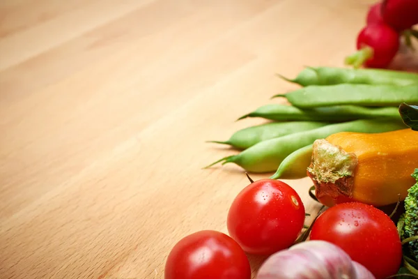 Vegetables on a wood background