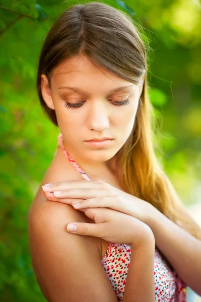 Portrait of charming young woman