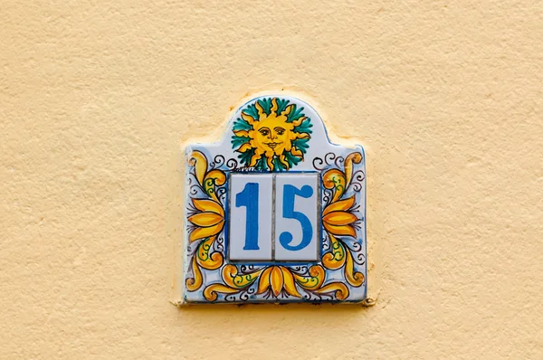 Local original house number plate at Santa Marina di Salina