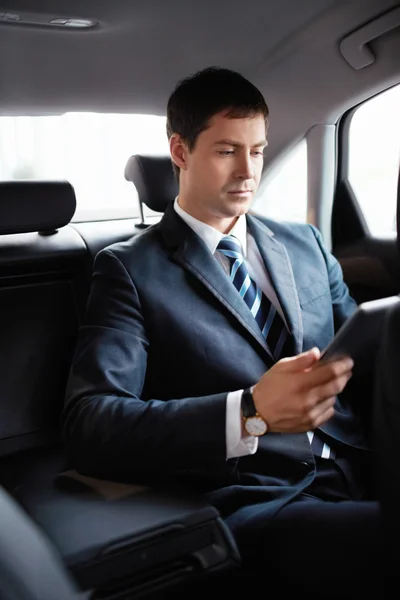 Businessman in a car