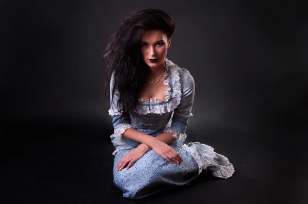 Weird female witch on black background