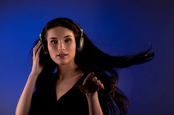 Young woman in headphones