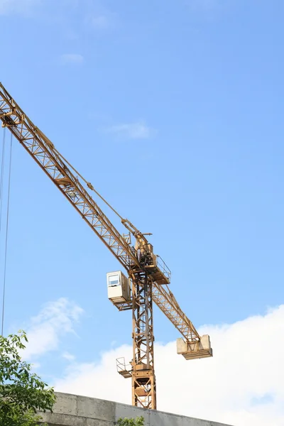 House develop with crane tower