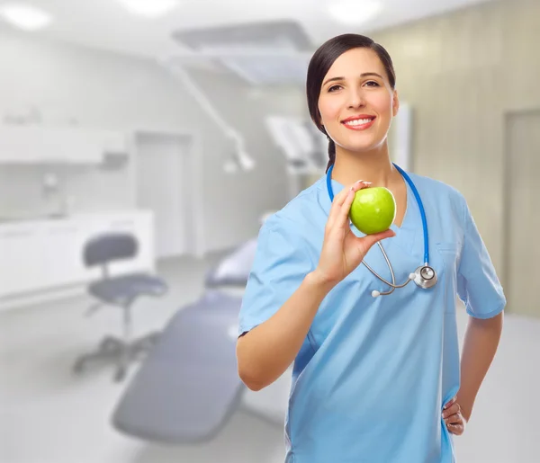 Doctor with green apple