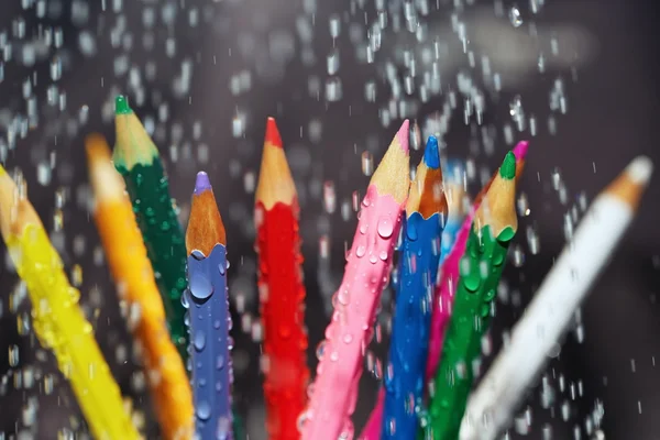 Color pencils under the rain