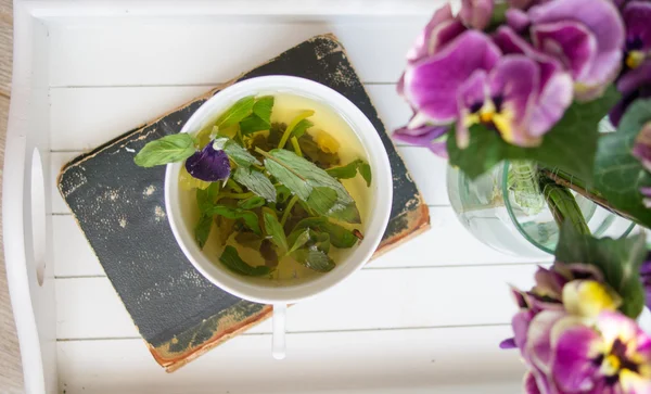 Mint tea, violas flowers and Good morning note