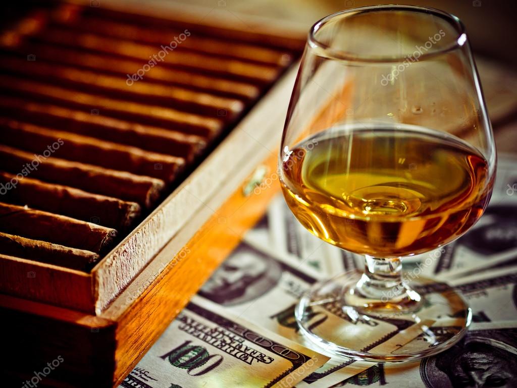 http://st.depositphotos.com/1003543/4492/i/950/depositphotos_44928371-Cognac-and-cigars.jpg