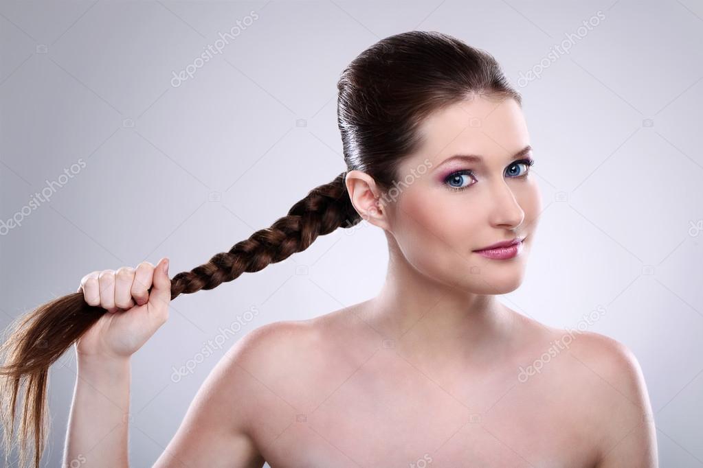 depositphotos_12792894-stock-photo-beautiful-woman-holding-her-hair.jpg