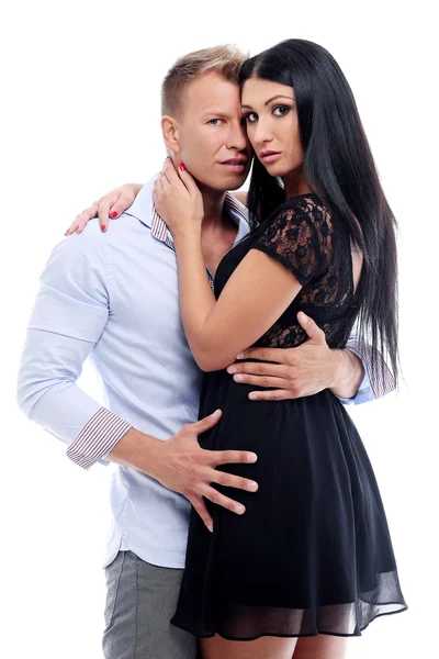 Sweet and sexy couple having a photo session in studio