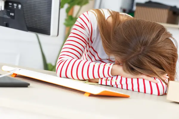 Attractive woman sleep at work