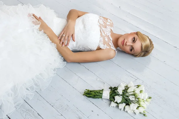 Attractive bride with beautiful bouquet