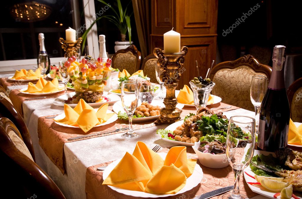 depositphotos_16228539-Table-with-food-a