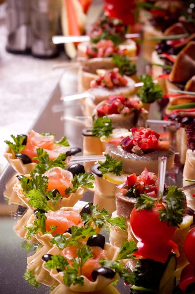 A lot of cold snacks on buffet table, catering