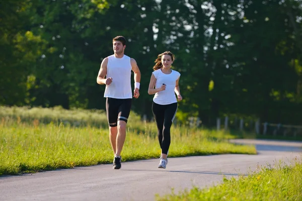 Young couple jogging — Stock Photo #12530348