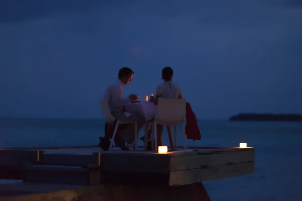 Romantic couple have outdoor dinner