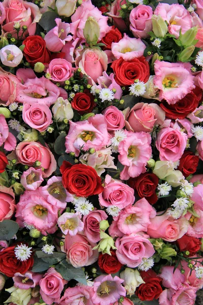 Red, pink and white wedding arrangement