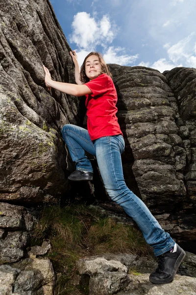 Girl climbing mountains
