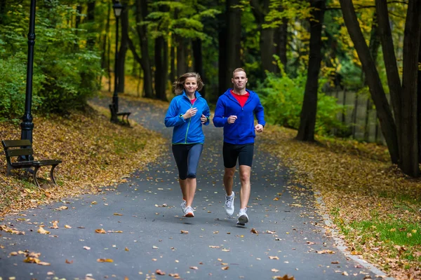 Woman and man running