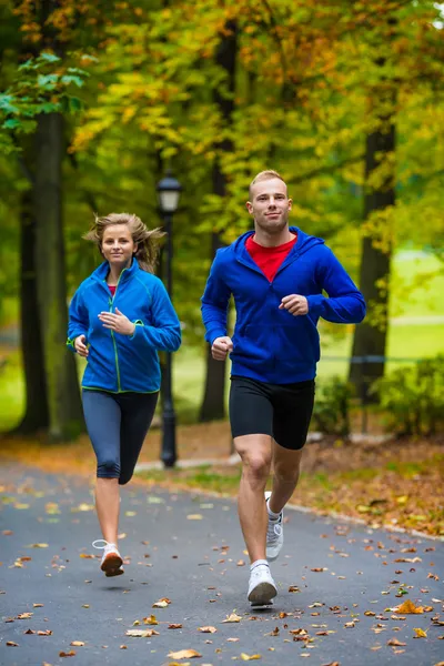 Woman and man running