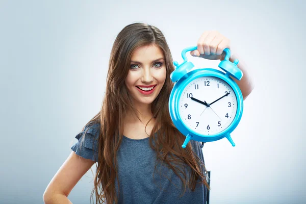 Young smiling woman hold watch.