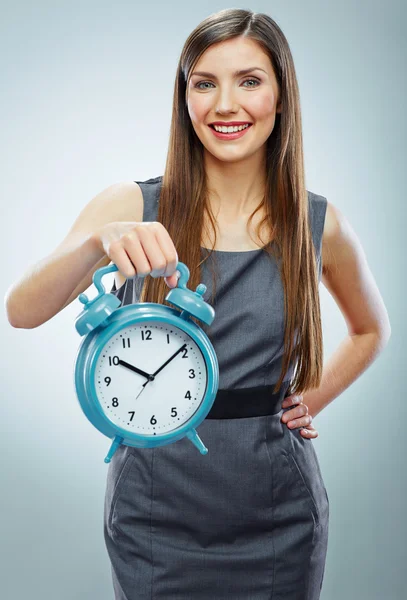 Business woman holding watch