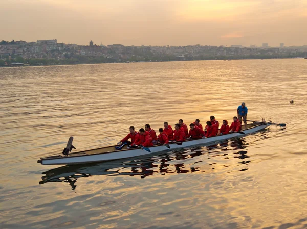 Rowing team practicing in the Golden Horn at sunset
