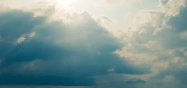 Storm clouds and sunrays