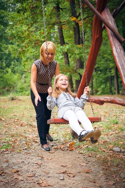 Mother and child in park