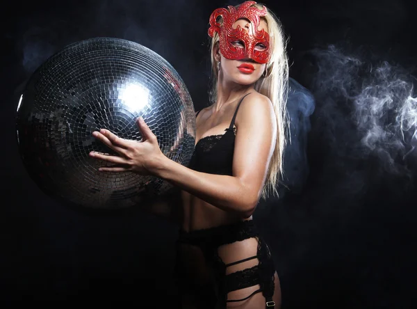 Lady in mask with disco ball