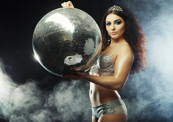 Dancer girl in smoke with disco ball