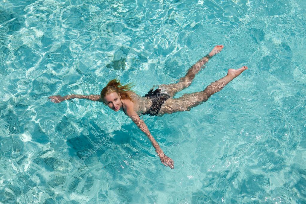 depositphotos_24738437-stock-photo-young-woman-swiming-in-sea.jpg