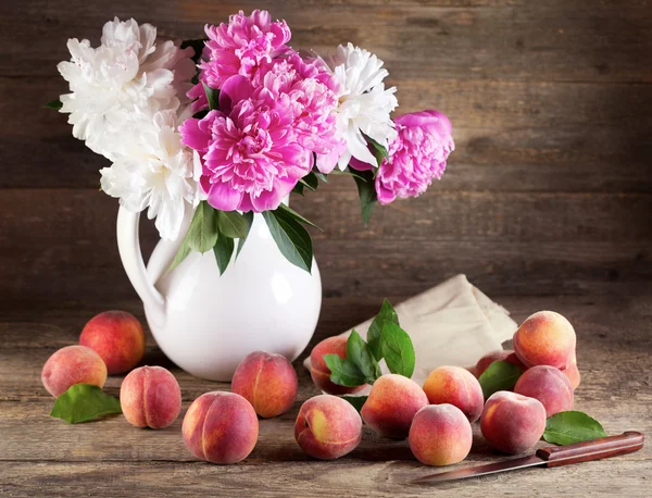 Bouquet of peonies and peaches